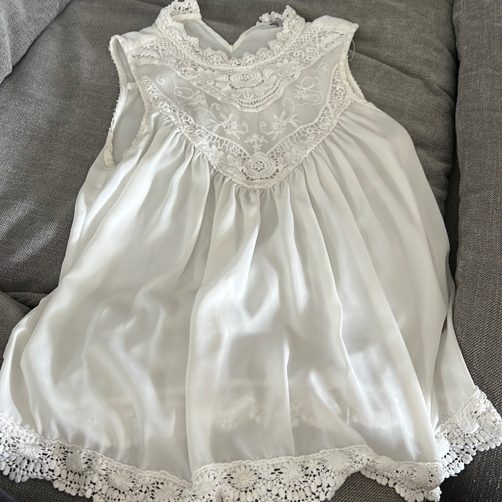 White flowy tank top.